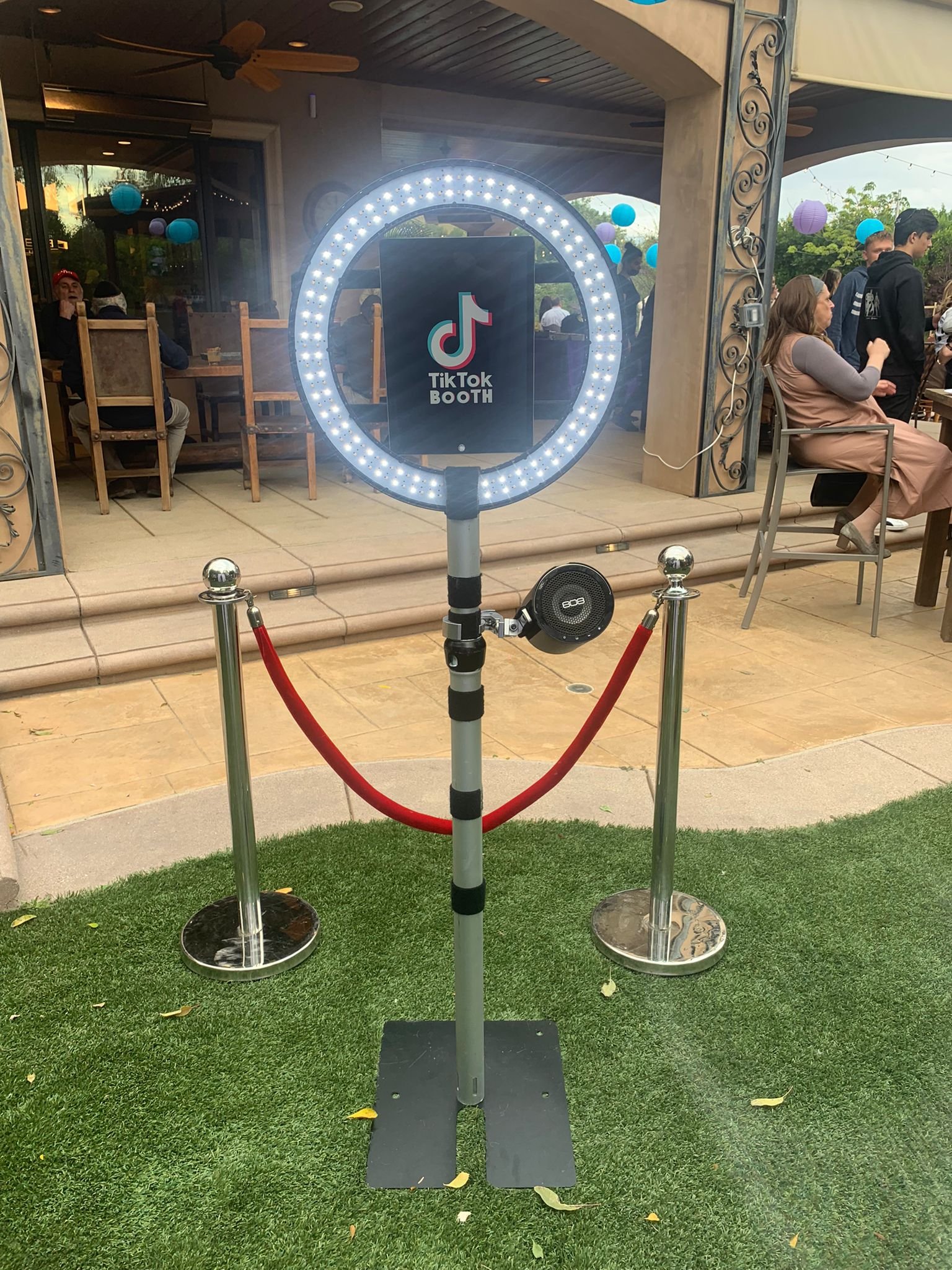 Guests recording a video in a TikTok booth in Los Angeles